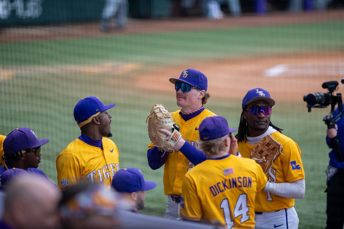 LSU baseball players stand before LSU's 8-1 win against Purdue Fort Wayne on Sunday, Feb. 16, 2025, at Alex Box Stadium on Gourrier Avenue in Baton Rouge, La.