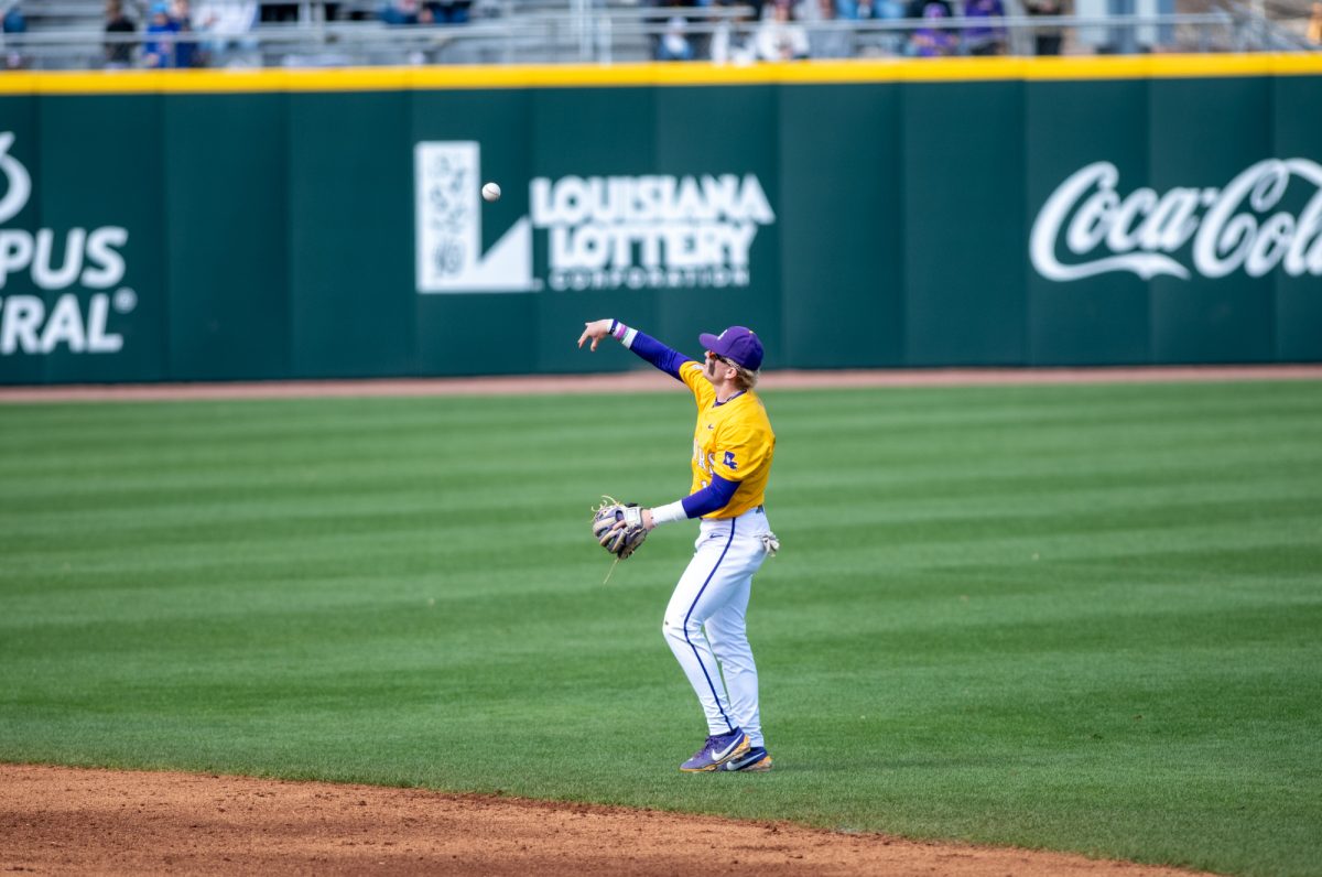 LSU baseball junior infielder Daniel Dickinson (14) throws the ball during LSU's 8-1 win against Purdue Fort Wayne on Sunday, Feb. 16, 2025, at Alex Box Stadium on Gourrier Avenue in Baton Rouge, La.