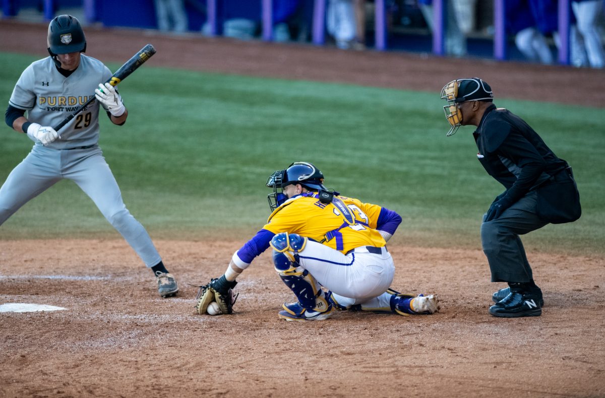 LSU baseball senior utility Luis Hernandez (23) catches a ball during LSU's 8-1 win against Purdue Fort Wayne on Sunday, Feb. 16, 2025, at Alex Box Stadium on Gourrier Avenue in Baton Rouge, La.