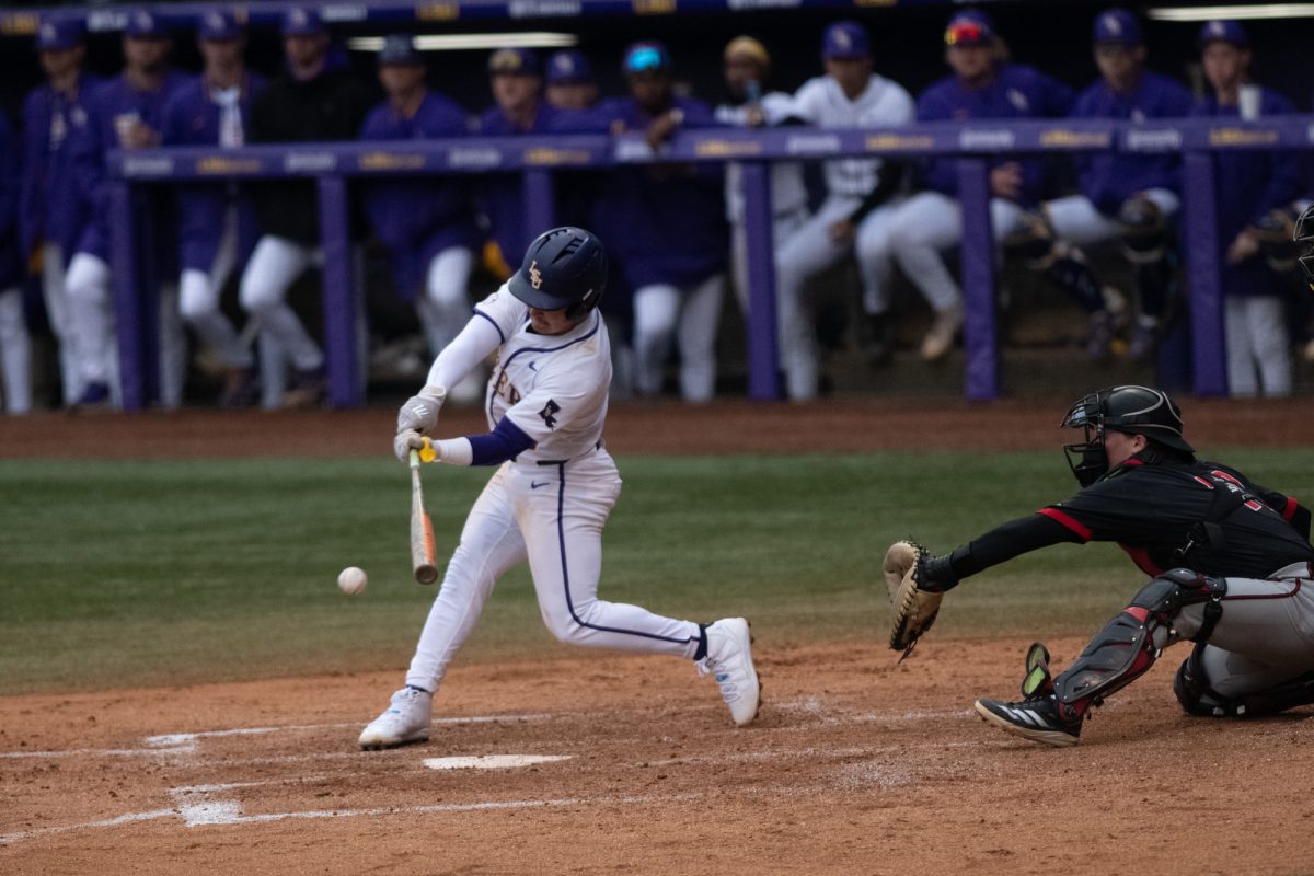 LSU baseball sophomore infielder Steven Milam (4) hits the ball during LSU's 4-2 win against Omaha on Friday, Feb 21, 2025, at Alex Box Stadium in Baton Rouge, La.