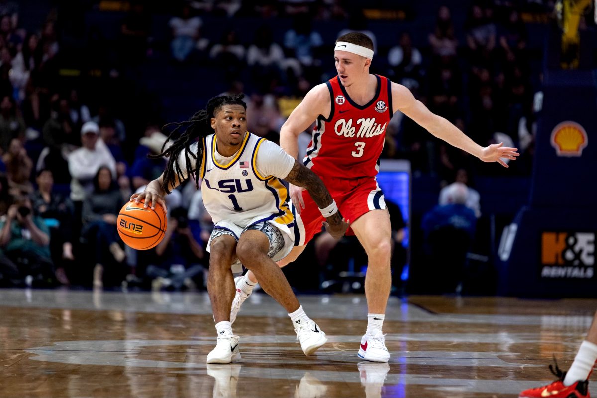 LSU men’s basketball fifth-year senior guard Jordan Sears (1) dribbles down the court during LSU's 70-72 loss against Ole Miss on Saturday, Feb. 9, 2025, in the Pete Maravich Assembly Center in Baton Rouge, La.