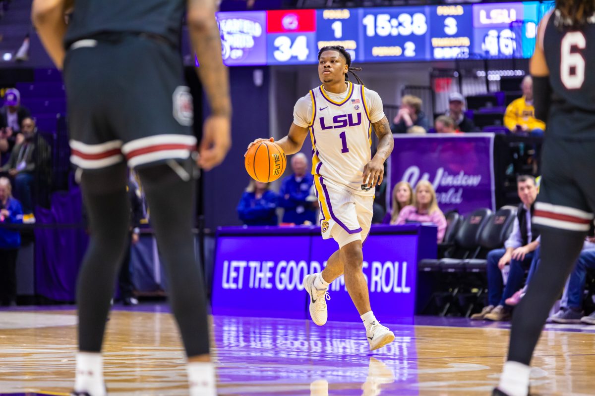 LSU men’s basketball fifth year senior guard Jordan Sears (1) dribbles down the court during LSU's 81-67 win against South Carolina on Tuesday, Feb. 18, 2025, in the Pete Maravich Assembly Center in Baton Rouge, La.