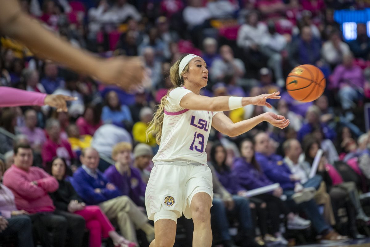 LSU women's basketball senior guard Last-Tear Poa (13) passes the ball Thursday, Feb. 20, 2025, during their 79-63 win against Georgia at the Pete Maravich Assembly Center in Baton Rouge, La.