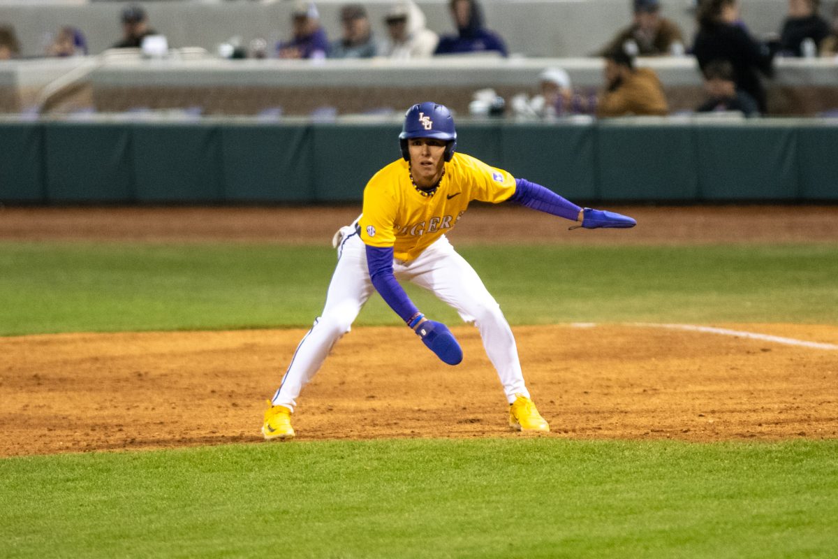 LSU baseball freshman outfielder Derek Curiel (6) takes his lead Saturday, Feb. 22, 2025, during LSU's 12-1 win over Omaha.