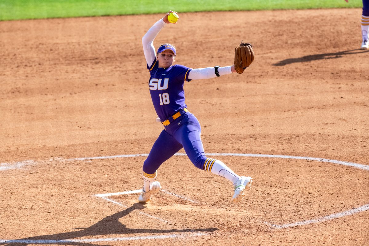 LSU softball redshirt junior pitcher Tatum Clopton (18) pitches the ball  Saturday, Feb. 8, 2025, during LSU's 10-0 win against Charlotte at Tiger Park in Baton Rouge, La.