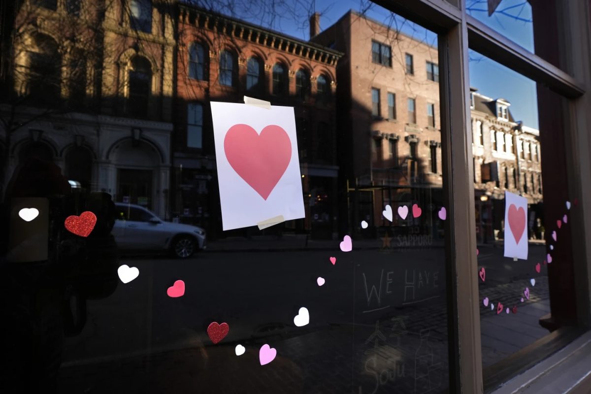 Valentine's Day hearts decorate a storefront on Exchange Street, Wednesday, Feb.14, 2024, in Portland, Maine.