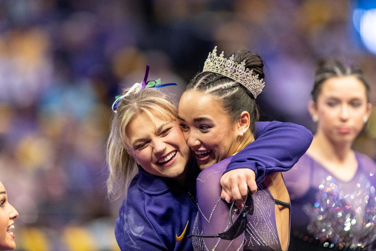 LSU gymnastics graduate student Sierra Ballard and all-around senior Aleah Finnegan embrace after a successful vault jump during the LSU 198.000-197.175 win against Missouri on Friday, January 31, 2025, at the Pete Maravich Assembly Center in Baton Rouge, LA.