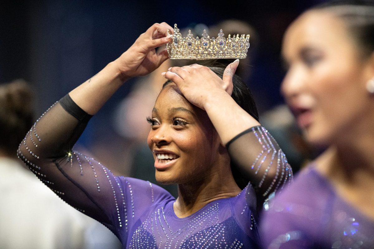 LSU gymnastics all-around freshman Kaliya Lincoln adjusts her crown after a successful vault jump during the LSU 198.000-197.175 win against Missouri on Friday, January 31, 2025, at the Pete Maravich Assembly Center in Baton Rouge, LA.