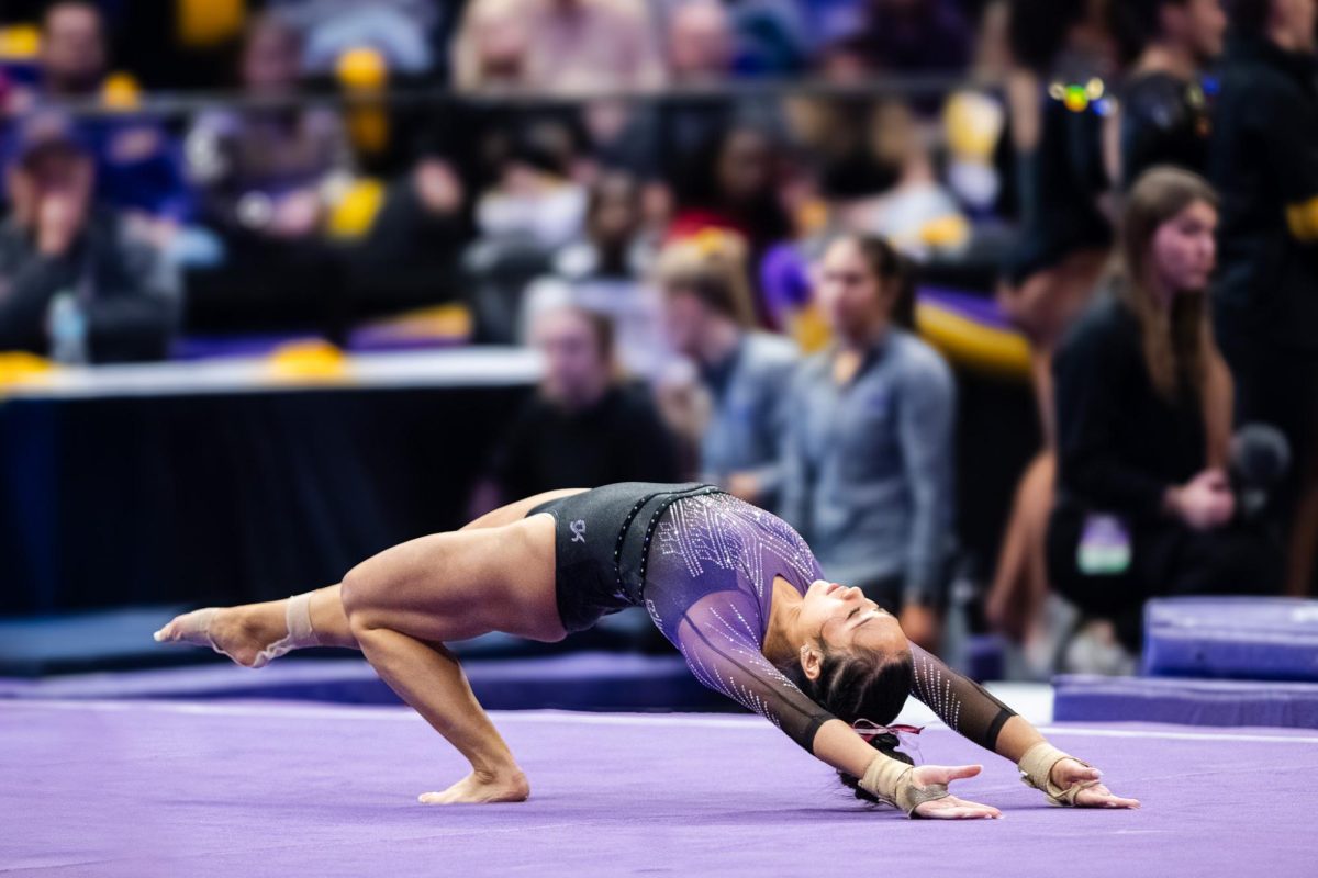 LSU gymnastics all-around freshman Kailin Chio levitates for her floor routine during the LSU 198.000-197.175 win against Missouri on Friday, January 31, 2025, at the Pete Maravich Assembly Center in Baton Rouge, LA.