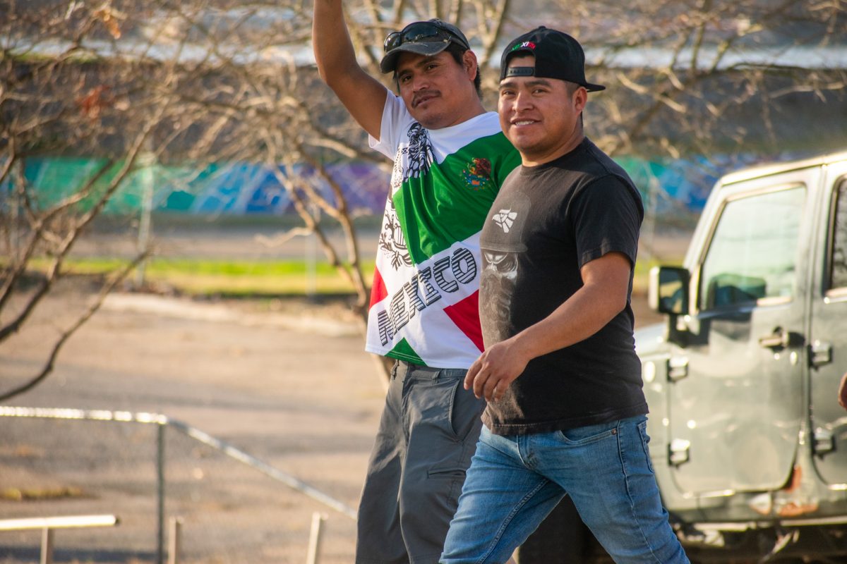 Protesters take the streets, marching in opposition to mass deportation Sunday, Feb. 2, 2025, at Convention Street and River Road in downtown Baton Rouge, La.