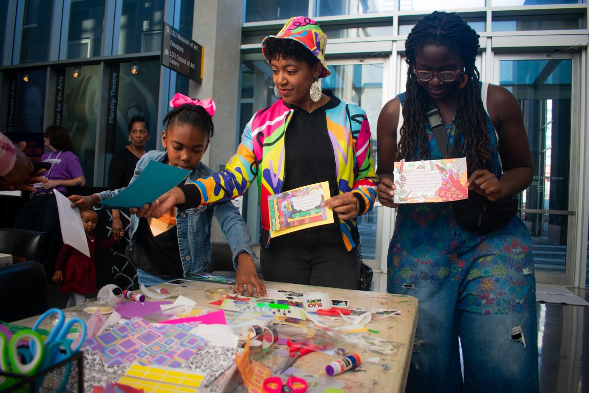 Attendees work on their collages in celebration of Black History Month Sunday, Feb. 3, 2025, at the LSU Museum of Art in Baton Rouge, La.