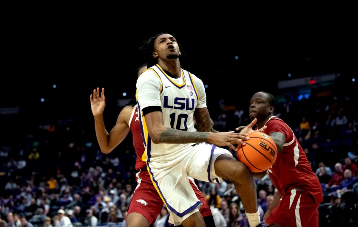 LSU men's basketball redshirt junior forward Daimion Collins (10) jumps to score during LSU's 78-74 win against Arkansas on Tuesday, Jan. 14, 2025, in the Pete Maravich Assembly Center in Baton Rouge, La.