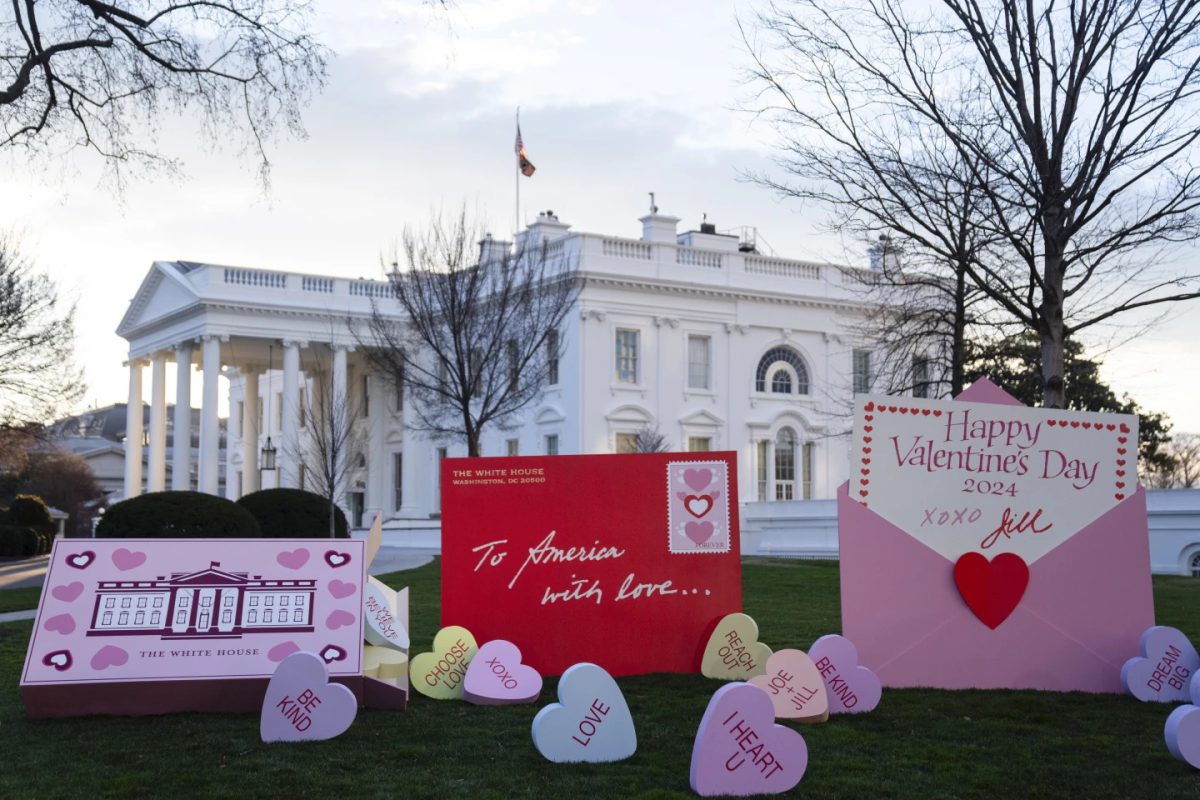 Decorations for Valentine's Day adorn the White House lawn, Wednesday, Feb. 14, 2020, in Washington.