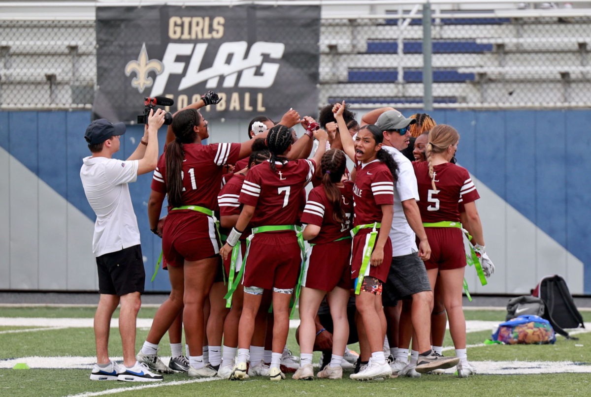 A team gathers at the 2024 Saints Girls High School Championship Games on March 4, 2024.