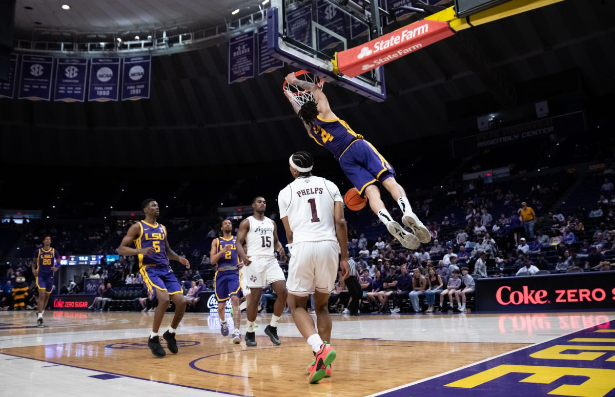 LSU men's basketball graduate student guard Dji Bailey (4) hangs on the rim during LSU's 66-52 loss to Texas A&amp;M on Saturday, March 8, 2025, in the Pete Maravich Assembly Center in Baton Rouge, La.