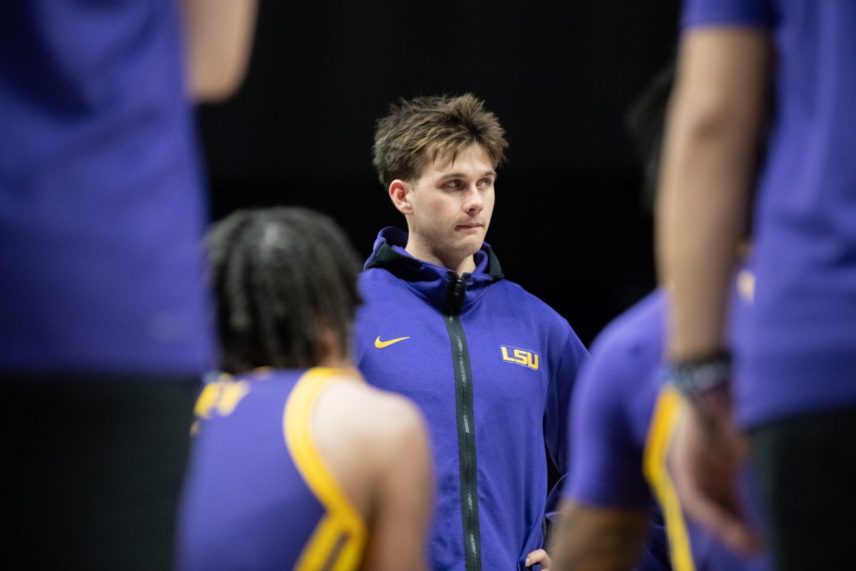 LSU men's basketball 5th-year senior guard Trace Young (14) stands during a timeout during LSU's 66-52 loss to Texas A&amp;M on Saturday, March 8, 2025, in the Pete Maravich Assembly Center in Baton Rouge, La.