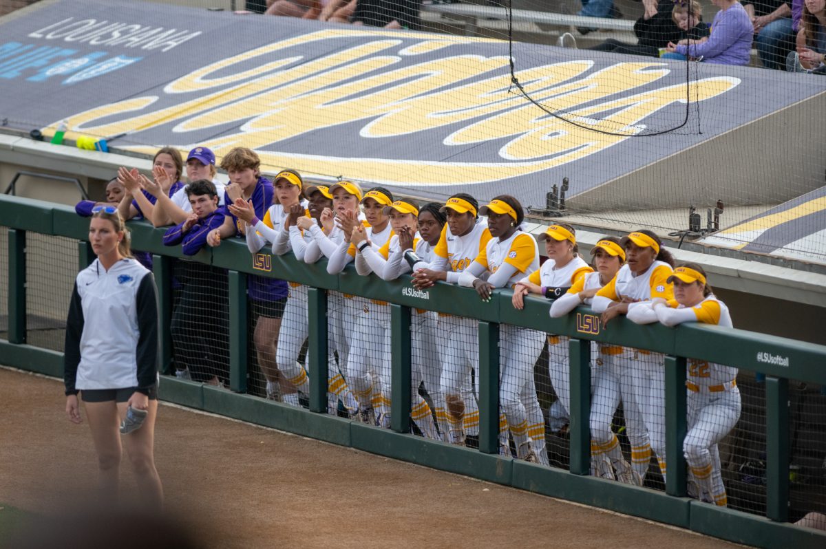 LSU softball players watch their teammates during LSU's 4-1 win over Kentucky on Friday, March 14, 2025, at Tiger Park in Baton Rouge, La.