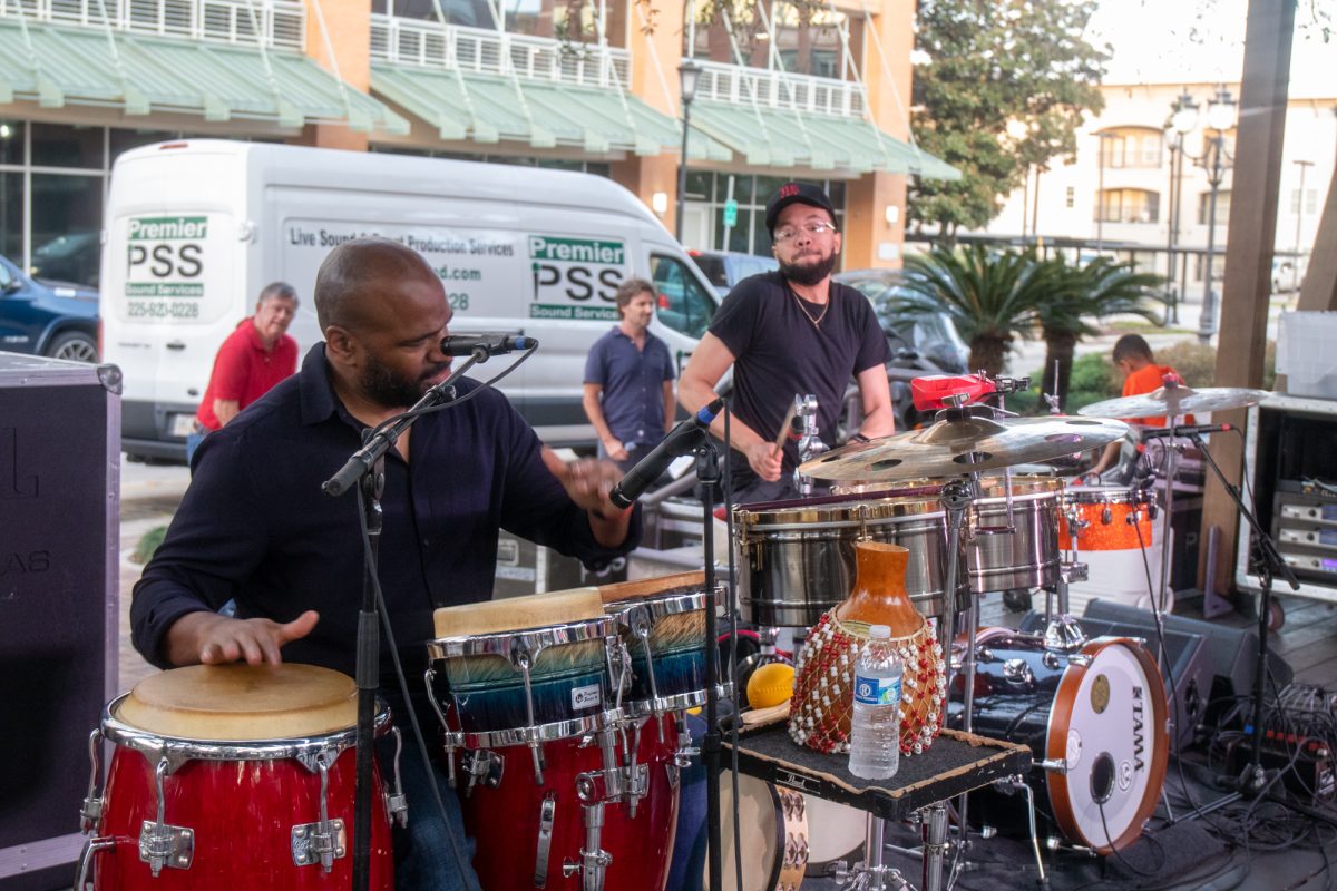 A bongo player and drummer play Thursday, March 13, 2025, at Perkins Rowe in Baton Rouge, La.