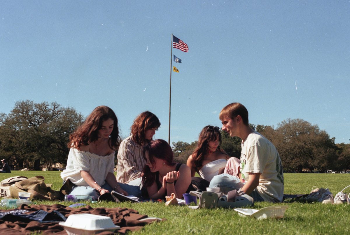 LSU students Isabella Geiger ('27), Elanor Cate ('27), Mikey Chopin ('27), Jenny Dwyer ('27) and Julia Tucker ('28) study outside on Tuesday, March 11, 2025 at 3750 Highland Road, Baton Rouge, LA 70802.