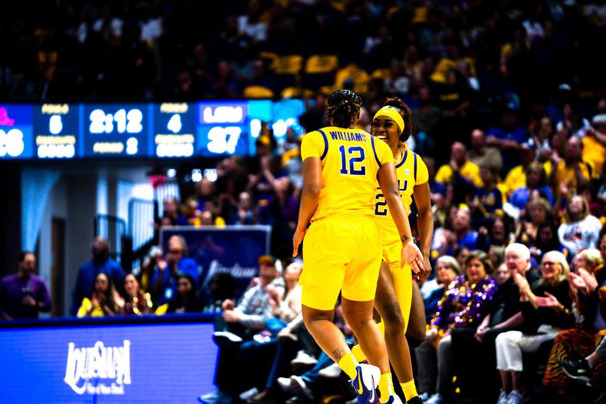 LSU women's basketball sophomore guard Mikaylah Williams (12) and LSU senior forward Aneesah Morrow (24) celebrate after LSU scores a bucket on Sunday, Mar. 2, 2025, during No. 7 LSU's loss against Ole Miss at the Pete Maravich Assembly Center on N Stadium Dr in Baton Rouge, La.