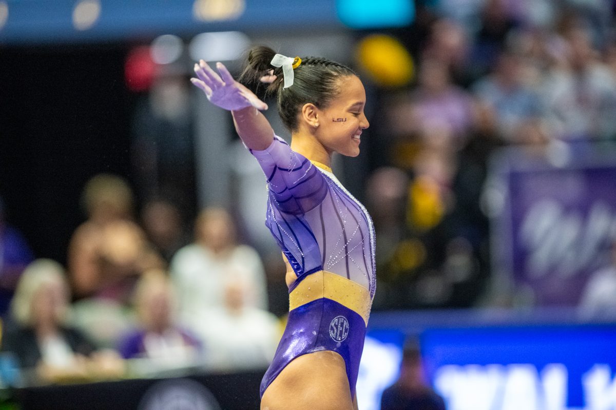 LSU gymnastics all around graduate student Haleigh Bryant salutes the judges before her routine Friday, March 7, 2025 during LSU's 198.575-197.175 win over Georgia in the Pete Maravich Assembly Center in Baton Rouge, La.