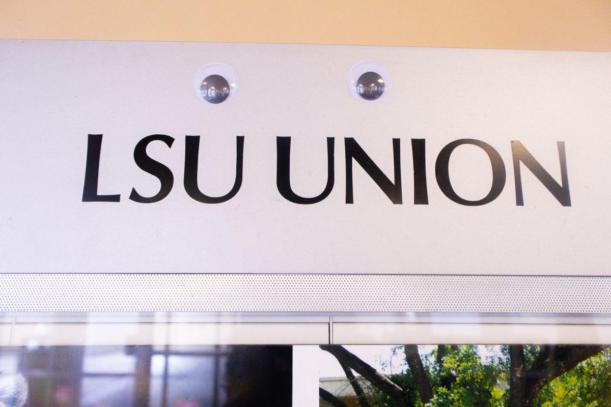 Googly eyes appear on a sign at the Student Union on Friday, March 14, 2025, at Louisiana State University in Baton Rouge, La.