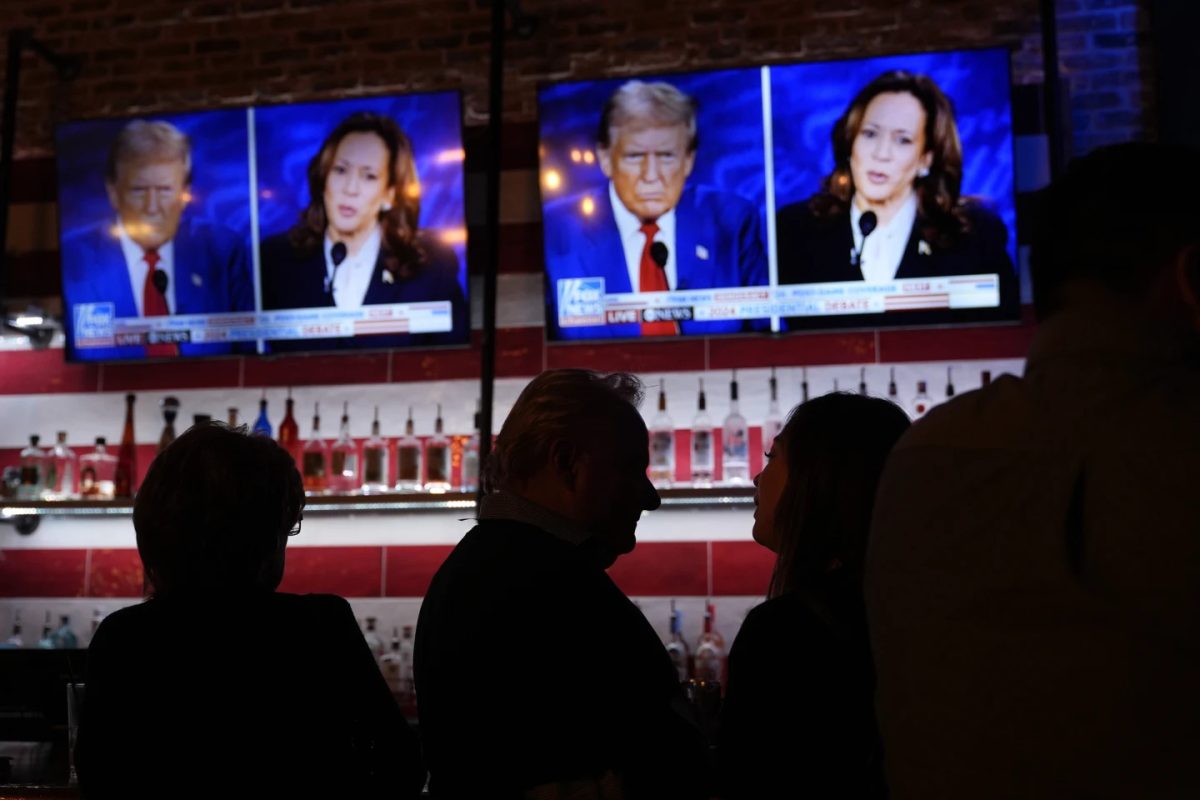 Viewers gather to watch a debate at the Angry Elephant Bar and Grill, Tuesday, Sept. 10, 2024, in San Antonio.