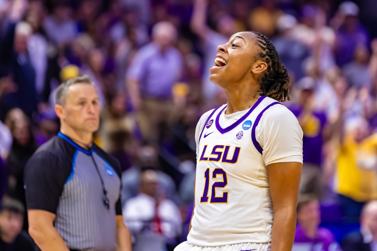 LSU women’s basketball sophomore guard Mikaylah Williams (12) yells for fans to get loud during LSU's 101-71 March Madness win against Florida State on Monday, March. 24, 2025, in the Pete Maravich Assembly Center in Baton Rouge, La.