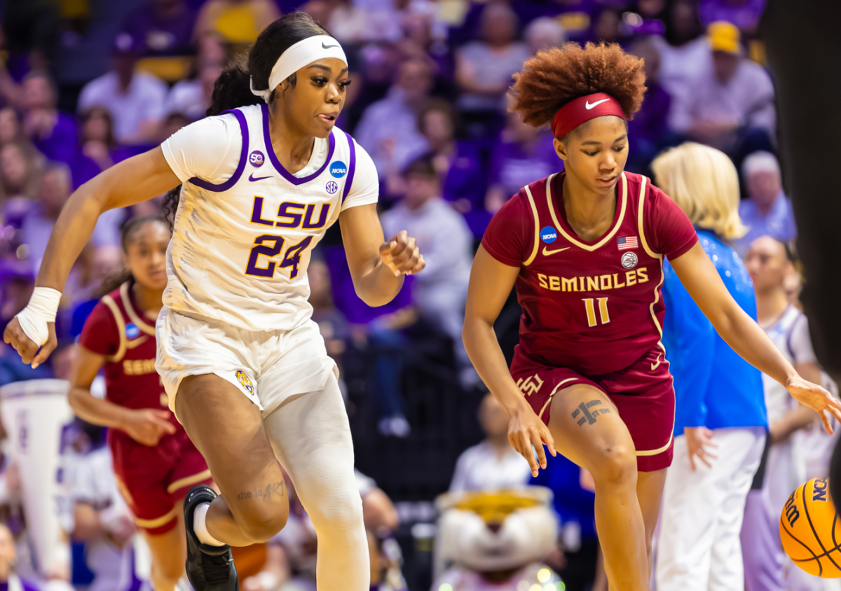 LSU women’s basketball senior forward Aneesah Morrow (24) attempts to guard Florida State women's basketball junior guard Sydney Bowles (11) during LSU's 101-71 March Madness win against Florida State on Monday, March. 24, 2025, in the Pete Maravich Assembly Center in Baton Rouge, La.