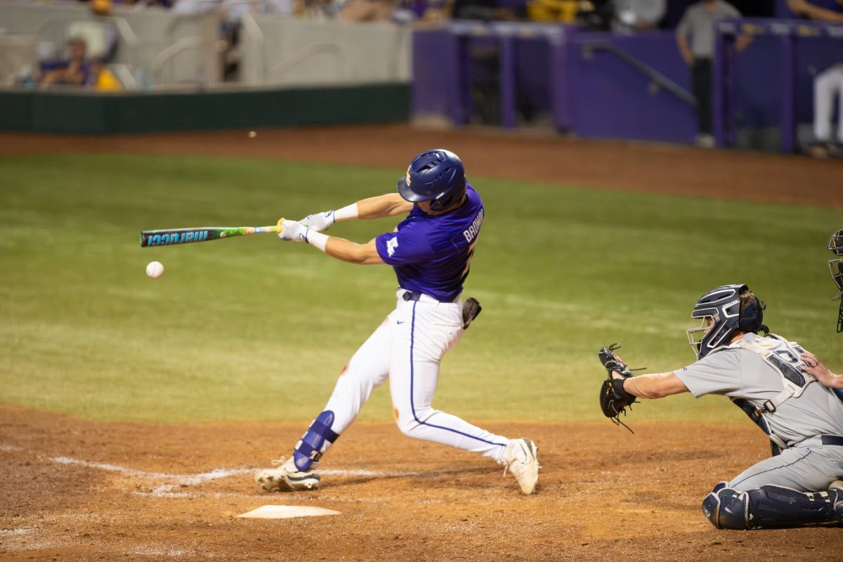 LSU baseball sophomore outfielder Jake Brown (7) walks on the field before LSU's 7-0 win over Little Rock on Friday, May 30, 2025, at Alex Box Stadium on Gourrier Avenue in Baton Rouge, La.