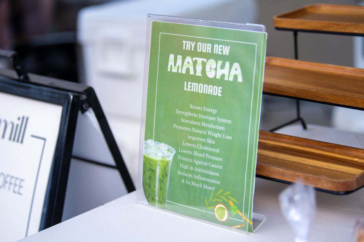 A sign advertising a matcha lemonade sits on a table during the Red Stick Farmers Market Saturday, July 12, 2025, on Main Street in Baton Rouge, La.