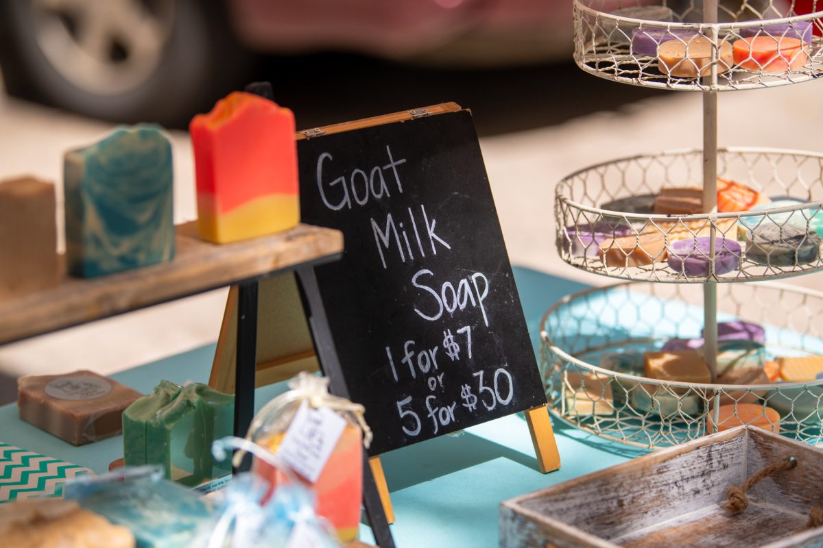 A stand sells goat milk soap during the Red Stick Farmers Market Saturday, July 12, 2025, on Main Street in Baton Rouge, La.