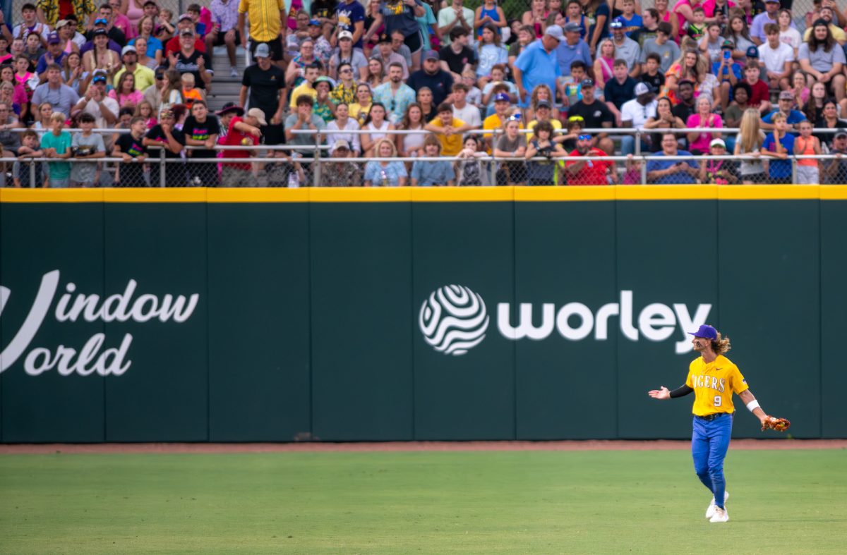 Former LSU baseball outfielder Zach Watson celebrates after a successful backflip catch Friday, Aug 8, 2025, at Alex Box Stadium in Baton Rouge, La.