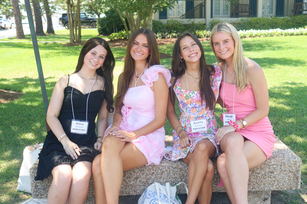 Potential New Members sit on a bench during Panhellenic Recruitment Friday, Aug 22, 2025 on West Lakeshore Drive in Baton Rouge, La.