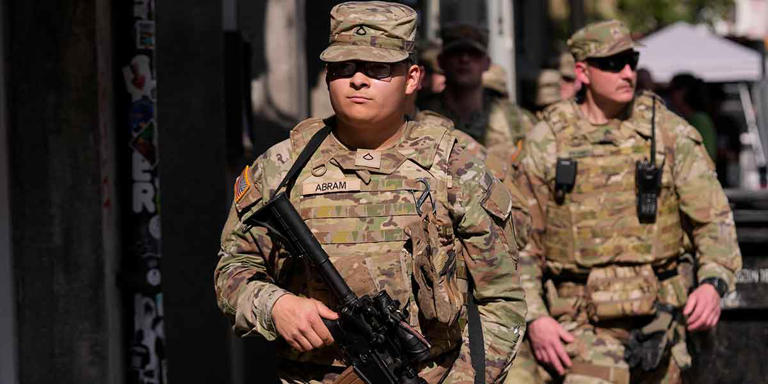 CORRECTS DATE OF SUPER BOWL - Members of the Louisiana National Guard patrol the French Quarter Monday, Feb. 3, 2025, in advance of the upcoming Super Bowl to be played Sunday, Feb. 9th, in New Orleans. (AP Photo/Gerald Herbert)
