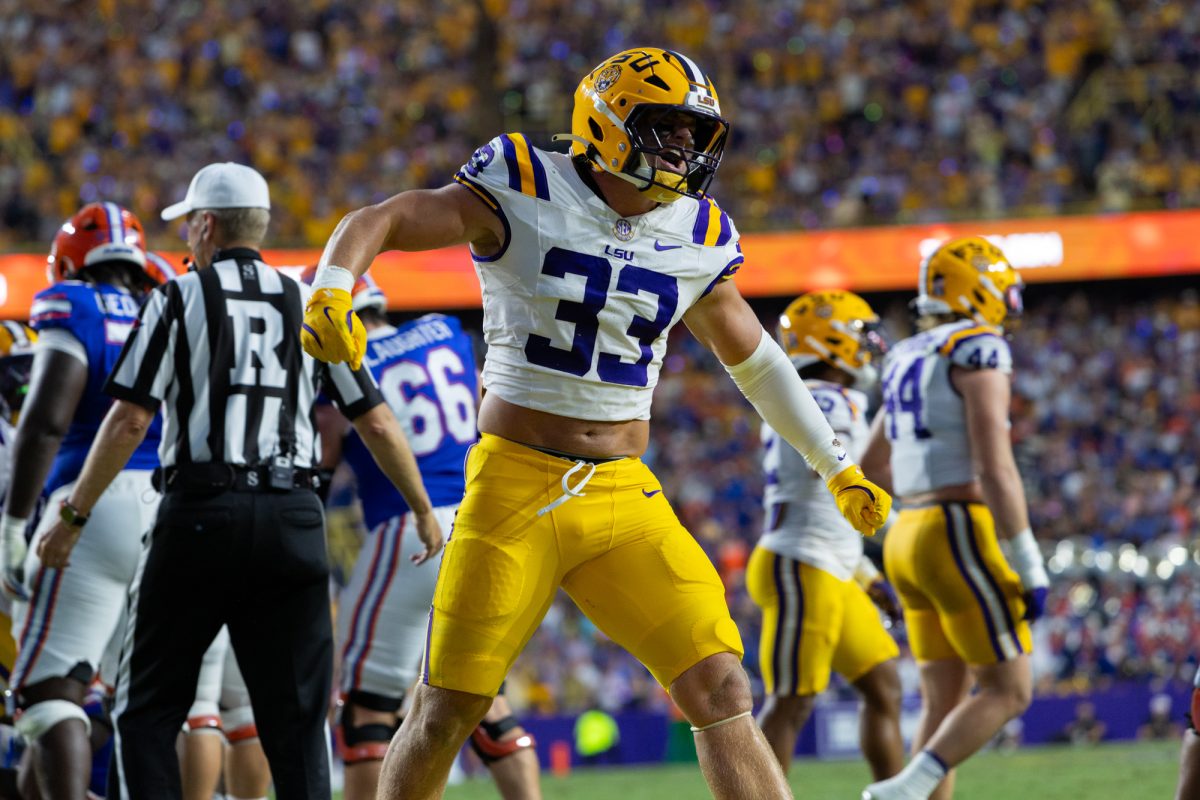 LSU football graduate student linebacker West Weeks (33) celebrates Saturday, Sept 13, 2025, during LSU's 20-10 win against Florida at Tiger Stadium in Baton Rouge, La.