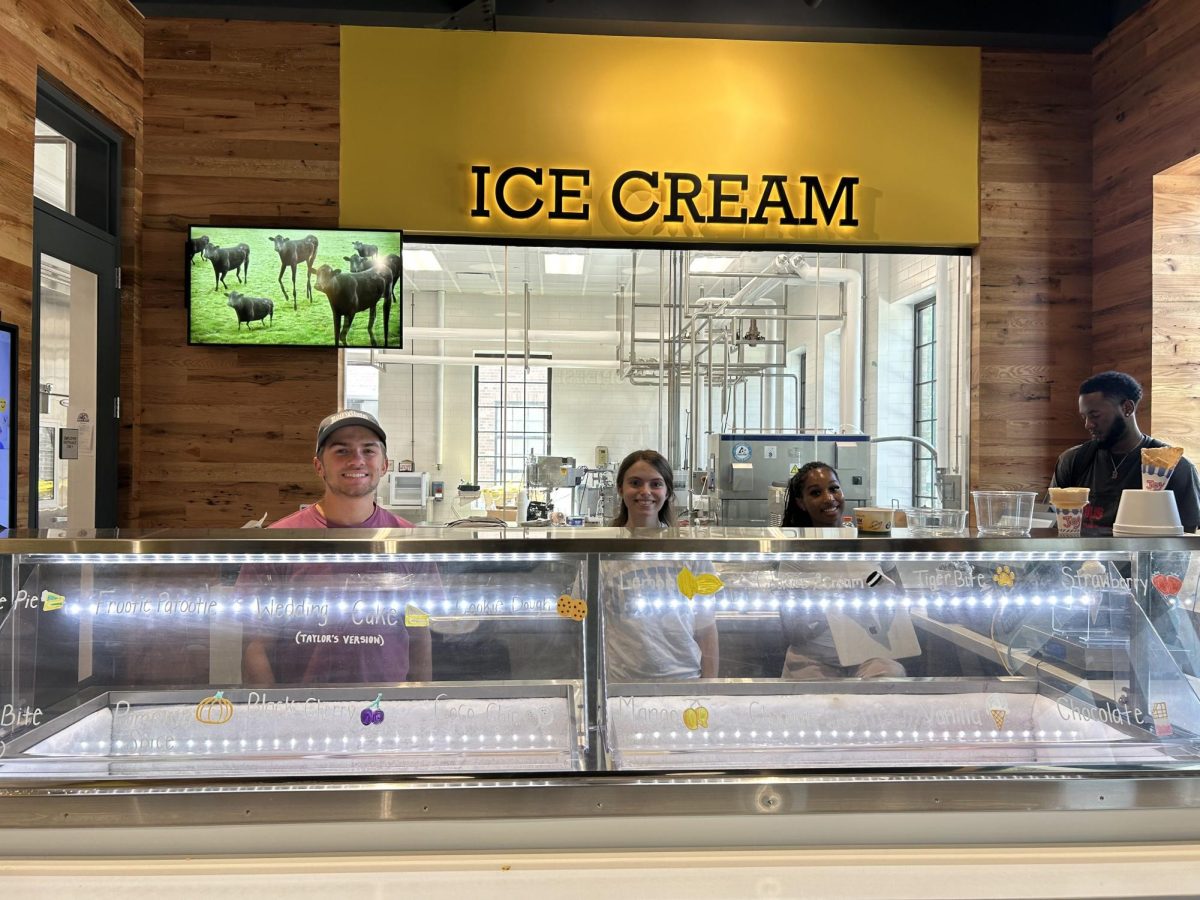 Employees smile behind the counter of the LSU AgCenter Dairy Store. (Madison Martin)