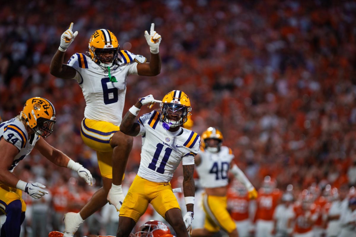 LSU football sophomore cornerback PJ Woodland (11) celebrates after sacking Clemson quarterback Cade Klubnik Saturday, Aug. 30, 2025, during LSU's 17-10 win against Clemson at Memorial Stadium in Clemson, Sc.