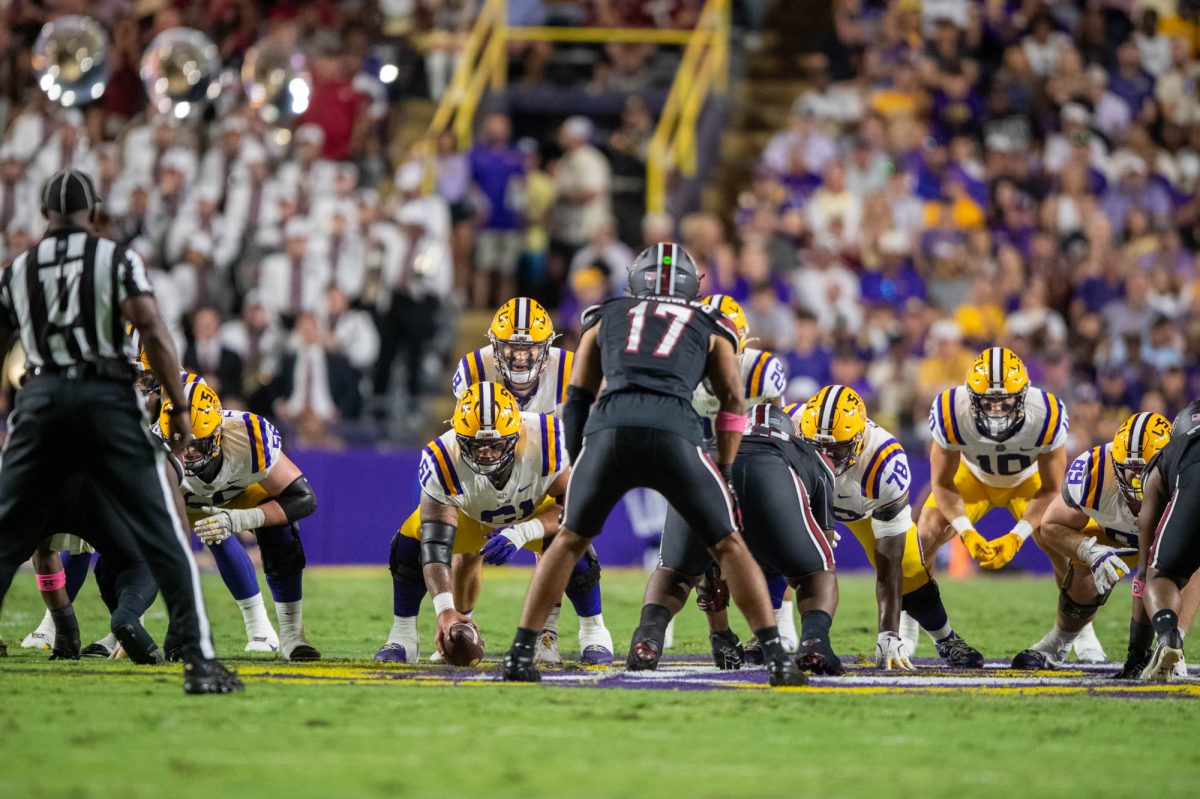 LSU football offense lines up on the line of scrimmage Saturday, Oct. 11, 2025, during their 20-10 win against South Carolina at Tiger Stadium in Baton Rouge, La.