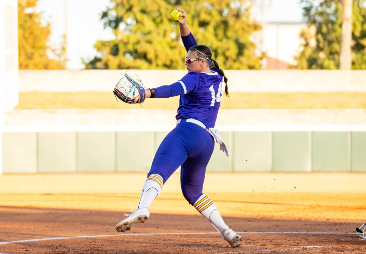 LSU softball freshman utility player Ashlin Mowery (14) pitches the ball during their win against Northwest Florida State Thursday, Oct. 30, 2025, at Tiger Park in Baton Rouge, La.