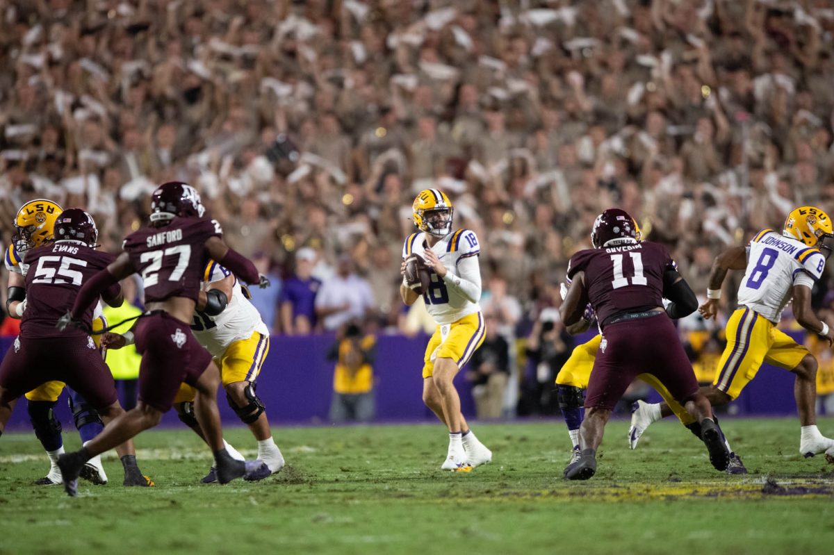 LSU football fifth-year senior Garrett Nussemeier (13) looks for an open man during their 49-25 loss against Texas A&M on Saturday, Oct. 25, 2025, at Tiger Stadium in Baton Rouge, La.