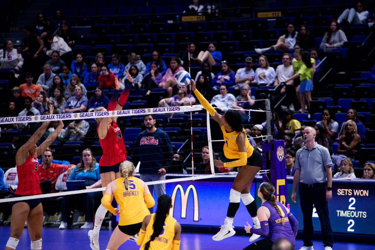 LSU volleyball junior middle blocker Angelina Lee (4) makes a hit during LSU’s 3-2 win against Ole Miss on Sunday, Nov. 2, 2025, at the Pete Maravich Assembly Center in Baton Rouge, La.