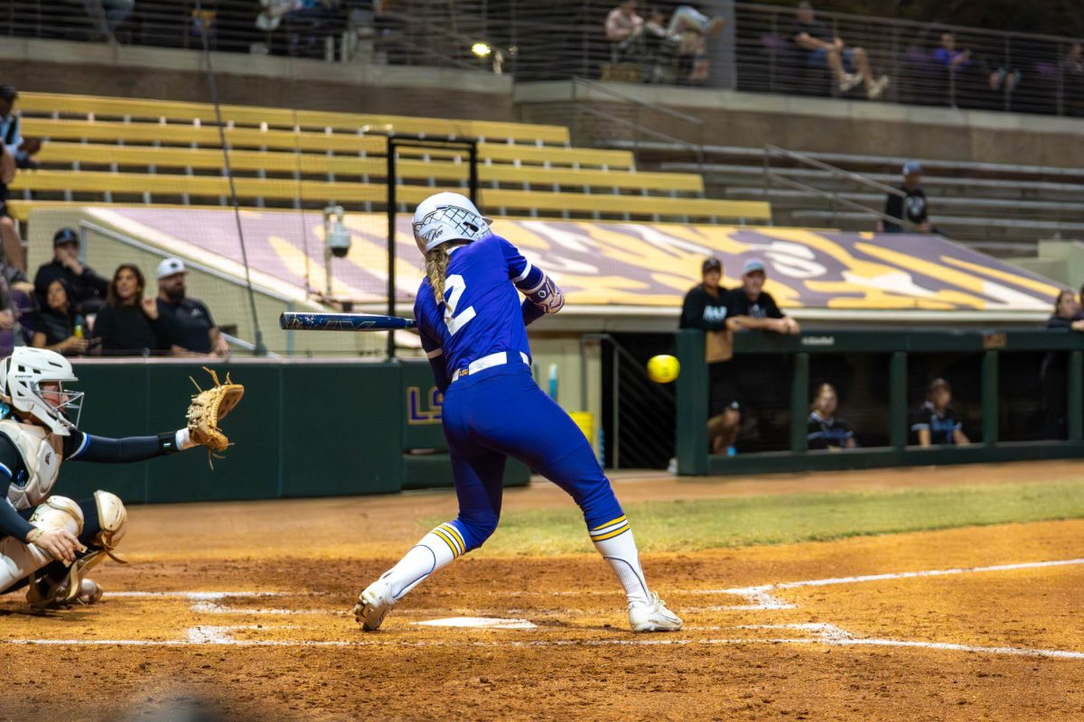 LSU softball junior utility player Maddox McKee (2) takes a swing during their win over Co-Lin Community College Wednesday, Nov. 12, 2025, at Tiger Park in Baton Rouge, La.
