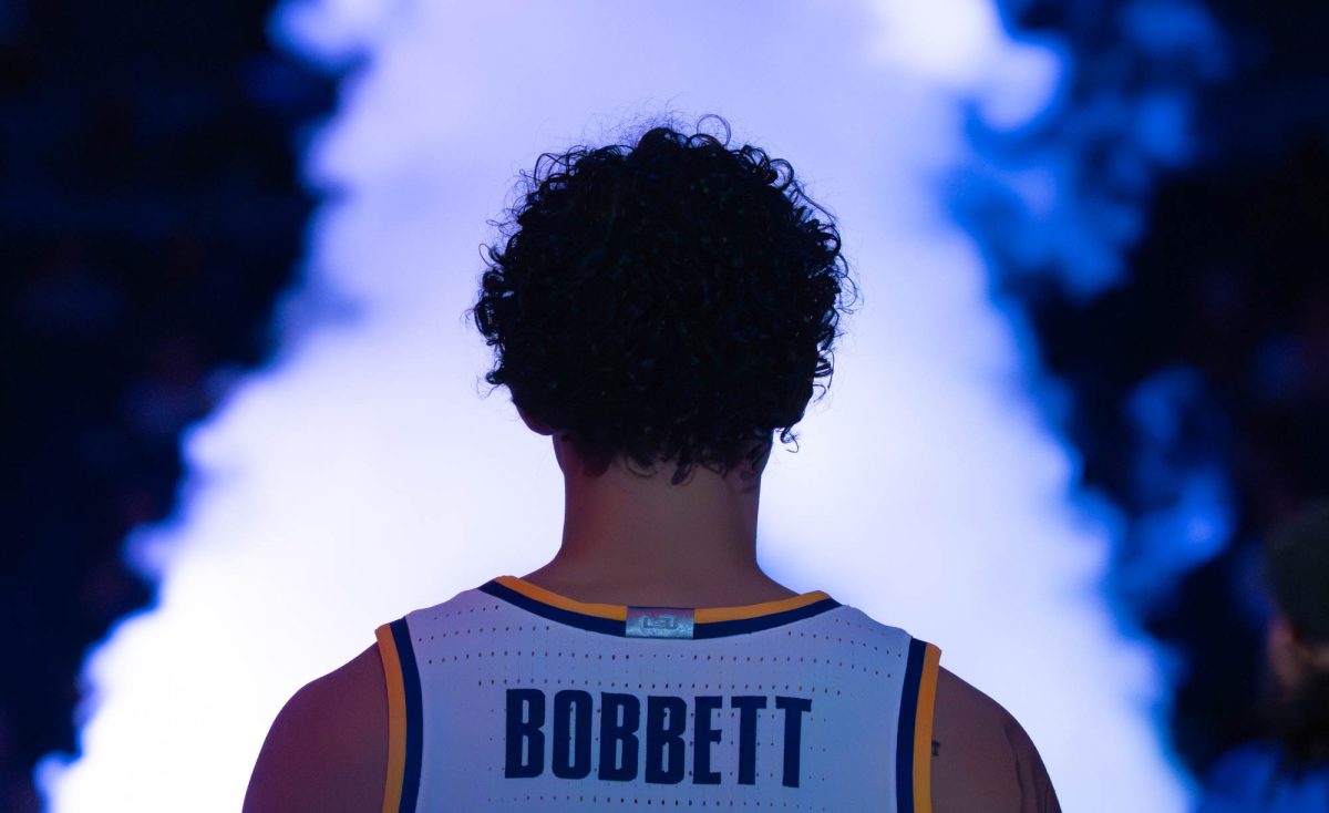 LSU men's basketball fifth-year senior guard Jaden Bobbett (14) stands to greet teammates during the Tigers' 107-81 win over Alcorn State Tuesday, Nov. 18, 2025, at the Pete Maravich Assembly Center in Baton Rouge, La.