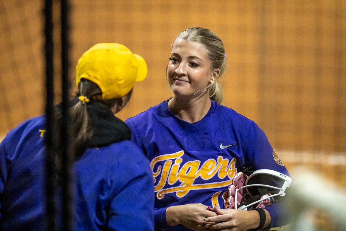 LSU softball head coach Beth Torina talks to freshman pitcher Lauryn Soeken (16) during their win against Belhaven Sunday, Nov. 2, 2025, at Tiger Park in Baton Rouge, La.