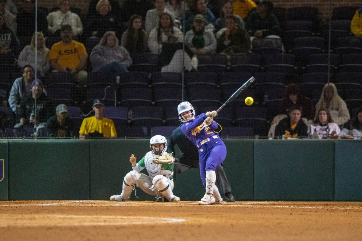 LSU softball redshirt sophomore utility Char Lorenz (27) hits the ball during their win against Belhaven Sunday, Nov. 2, 2025, at Tiger Park in Baton Rouge, La.