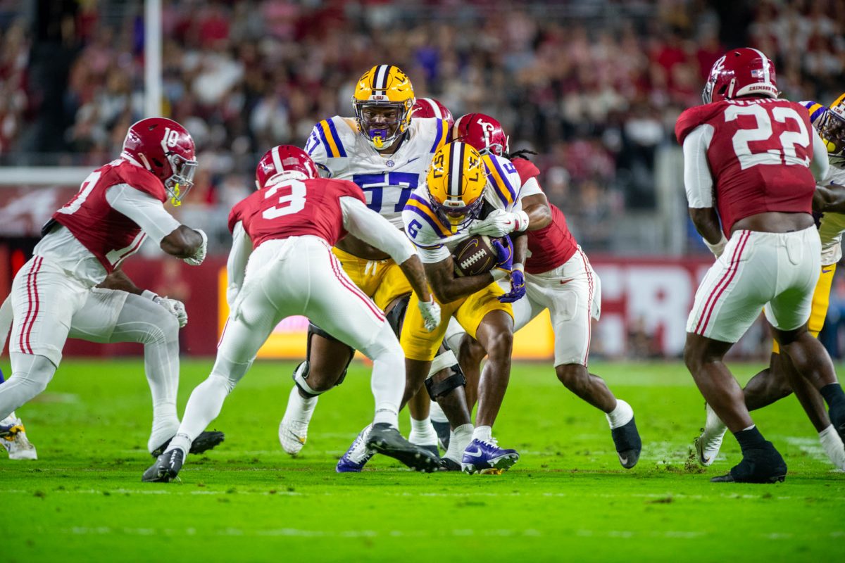 LSU football senior wide receiver Barion Brown (6) gets tackled Saturday, Nov. 8, 2025, during their game against Alabama at Bryant-Denny Stadium in Tuscaloosa, Al.