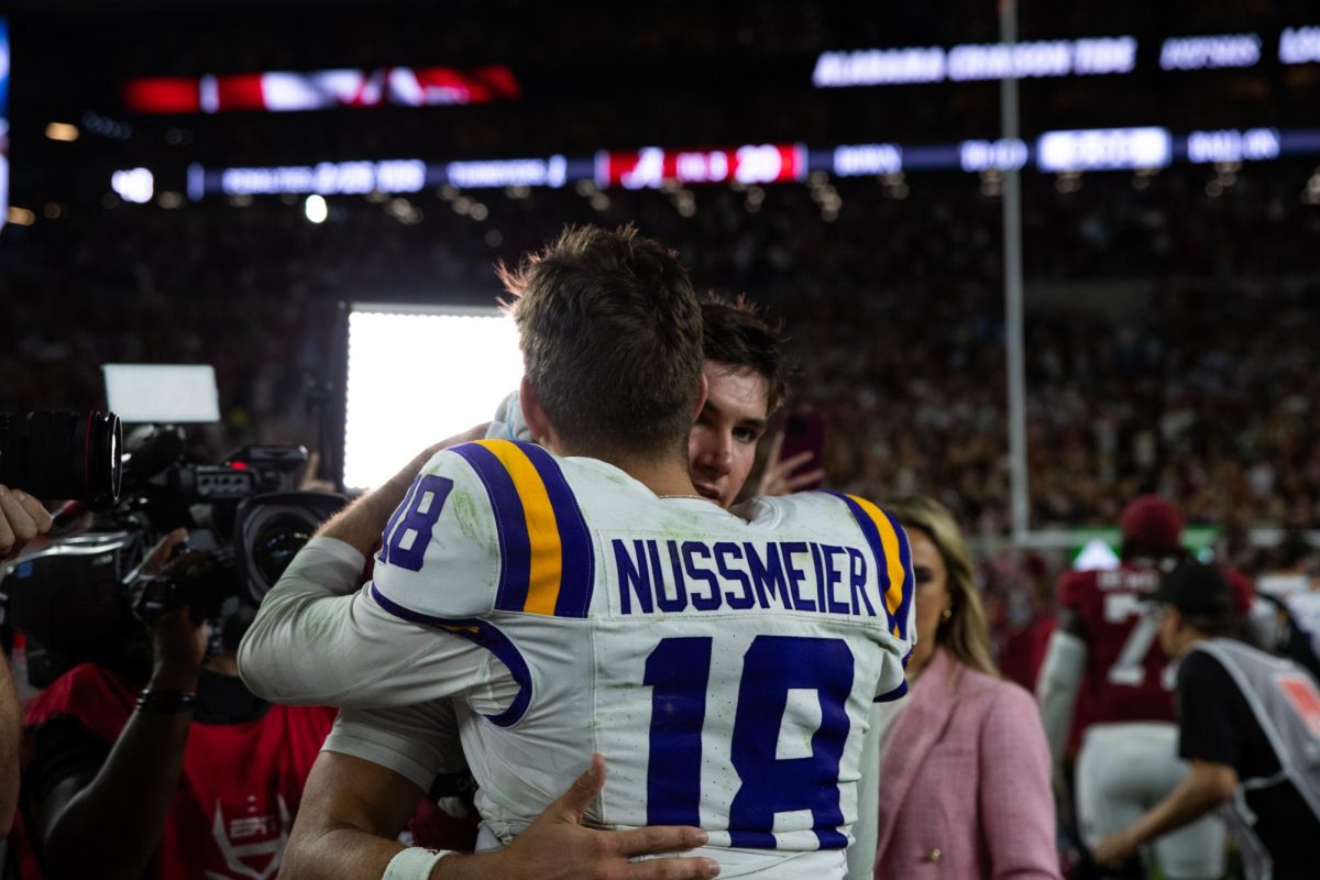LSU football fifth-year senior quarterback Garrett Nussmeier (18) speaks to Alabama quarterback Ty Simpson (15) Saturday, Nov. 8, 2025, after LSU’s 20-9 loss to Alabama at Bryant-Denny Stadium in Tuscaloosa, Al.