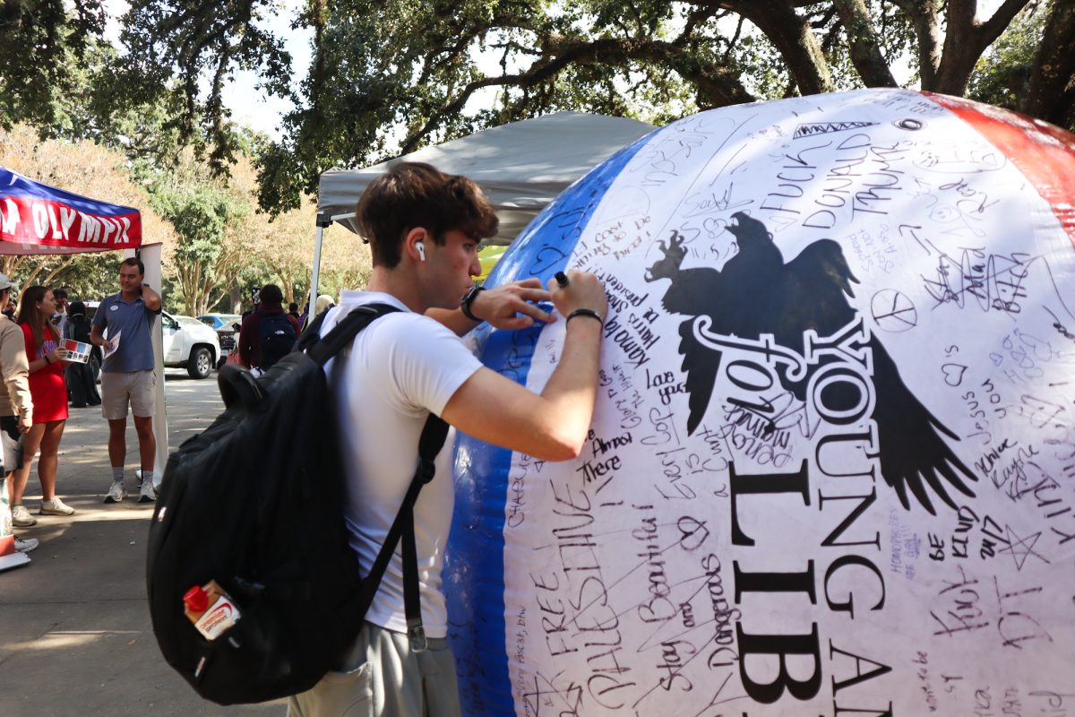 LSU students participate in the Young Americans for Liberty tablesit on Wednesday Nov. 5, 2025, at free speech alley in Baton Rouge, La.