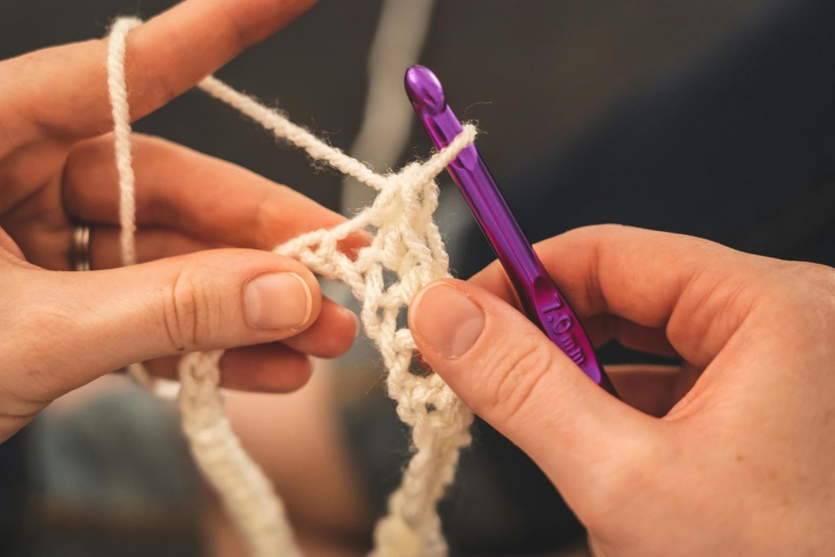 A person crocheting. (via Castorly Stock)